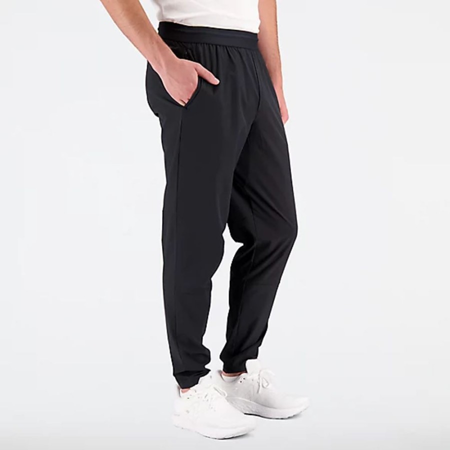 Homens New Balance Calcas E Leggings | Calcas R.W. Tech Stretch Woven